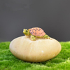 Turtle Ornament Figurine On The Stone